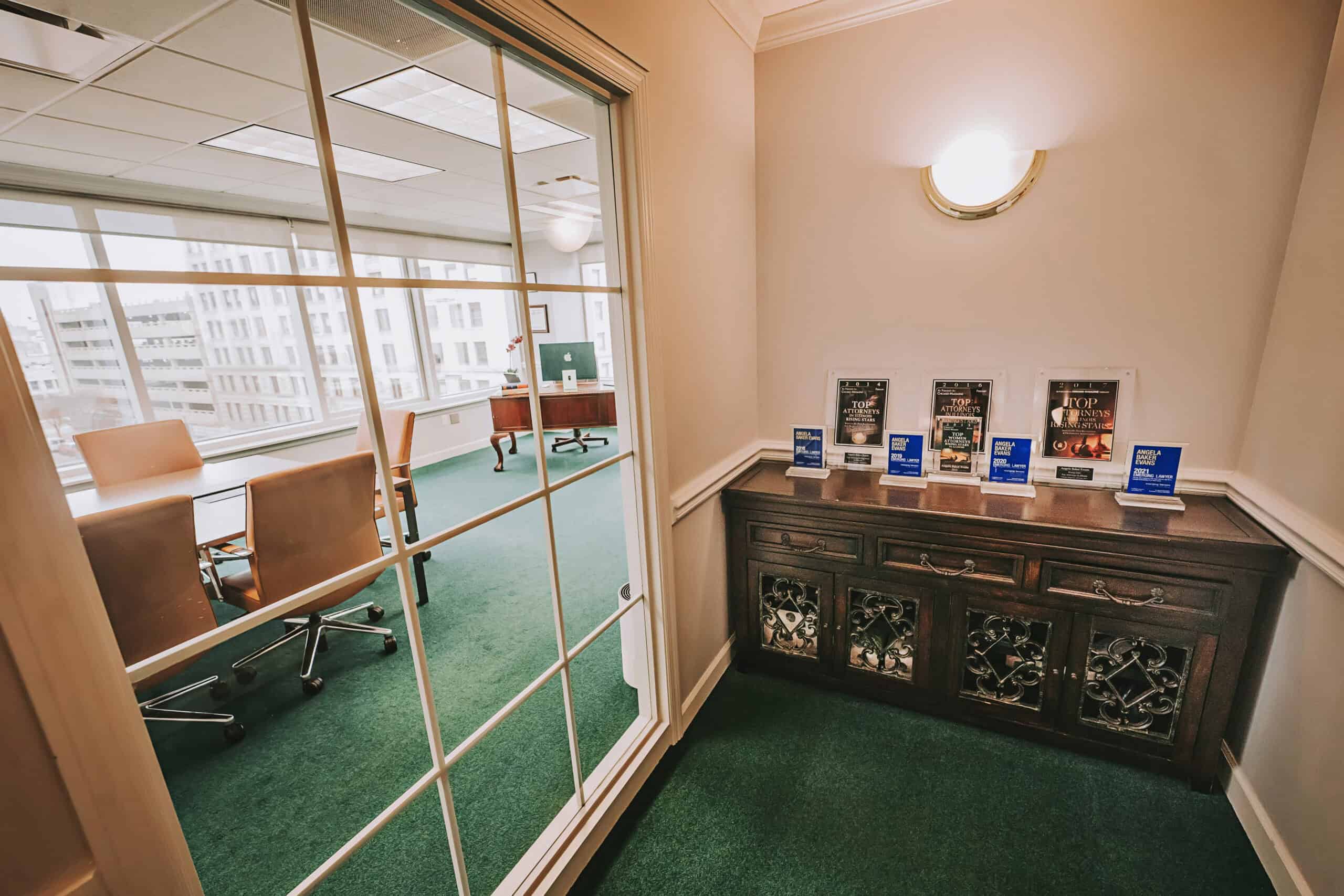 Office space with conference table and display of books on divorce and legal separation.